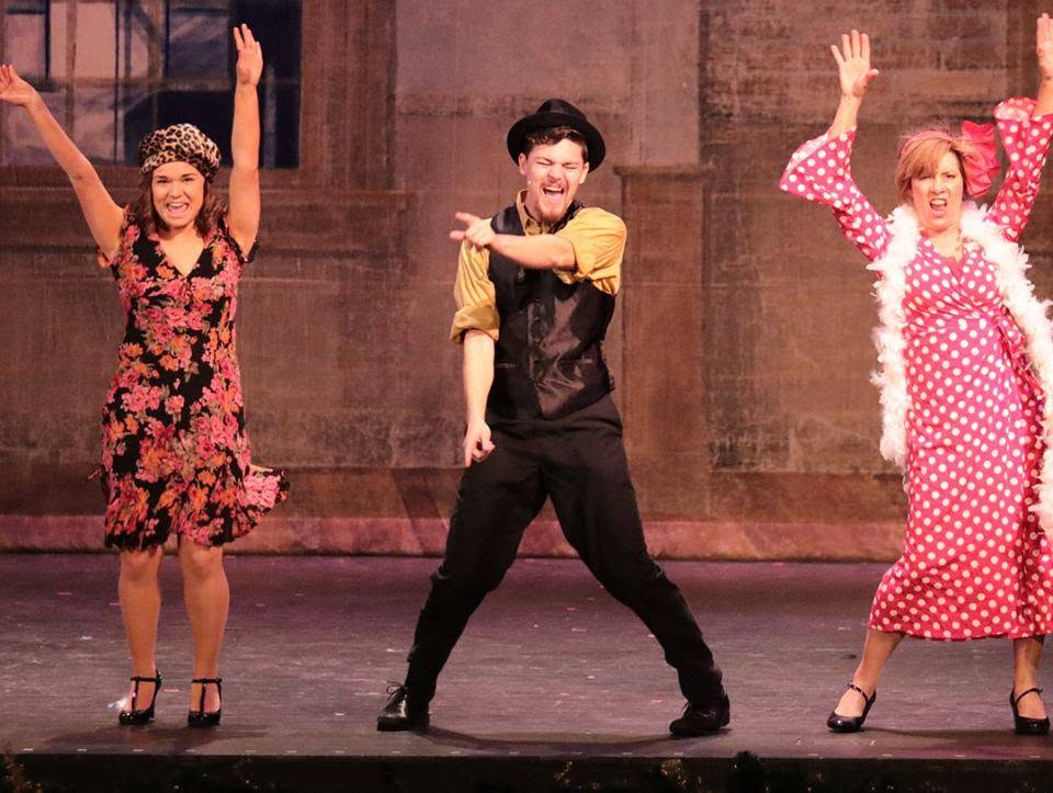 Andrew performing in a musical theatre production